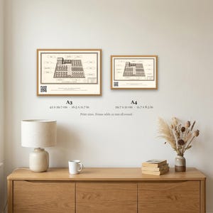 Personalised allotment plan print in blue-and-white technical lines: a blueprint of an allotment with numbered beds, a shed, water butt and compost heap, and a title block for the site name, plot number and owner.