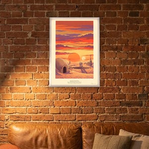 Twin suns sci fi art print in French colour lithograph style: two figures watch twin suns set over a desert homestead of domes and water towers at dusk. Shown framed in black, white or natural oak and unframed, with the style reference and behind-the-scenes shots.