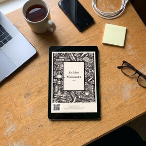 Personalised ex libris bookplate print in engraved ink on cream: a border of stacked books, a reading lamp and a cup of tea, with Ex Libris above and a mum's name and a year set in the centre.