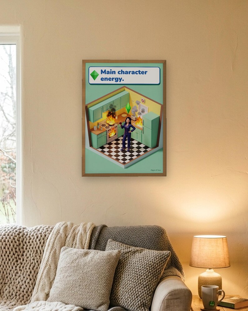 Main character energy funny kitchen print in bright life-sim game style: a calm woman in navy pyjamas holds a glass of red wine while her mint and lemon kitchen burns around her. Shown framed in black, white or natural oak and unframed, with behind-the-scenes shots.