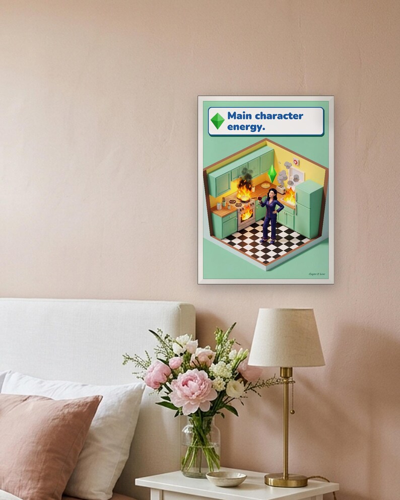Main character energy funny kitchen print in bright life-sim game style: a calm woman in navy pyjamas holds a glass of red wine while her mint and lemon kitchen burns around her. Shown framed in black, white or natural oak and unframed, with behind-the-scenes shots.