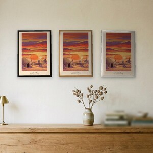 Twin suns sci fi art print in French colour lithograph style: two figures watch twin suns set over a desert homestead of domes and water towers at dusk. Shown framed in black, white or natural oak and unframed, with the style reference and behind-the-scenes shots.