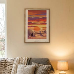 Twin suns sci fi art print in French colour lithograph style: two figures watch twin suns set over a desert homestead of domes and water towers at dusk. Shown framed in black, white or natural oak and unframed, with the style reference and behind-the-scenes shots.