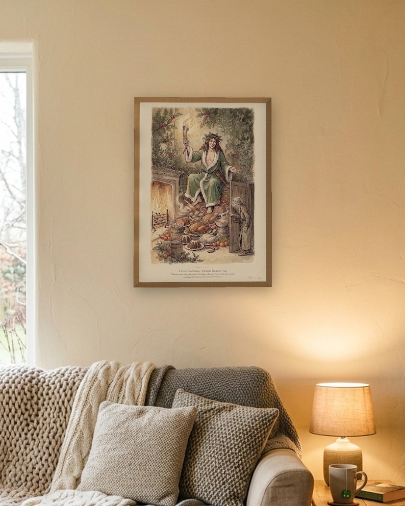 A Christmas Carol art print in Edwardian ink and watercolour style: the Ghost of Christmas Present in a green fur-trimmed robe and holly crown sits on a heap of Christmas food as Scrooge peers round the door. Shown framed in black, white or natural oak and unframed, with the style reference and behind-the-scenes shots.