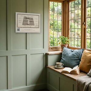 Personalised allotment plan print in blue-and-white technical lines: a blueprint of an allotment with numbered beds, a shed, water butt and compost heap, and a title block for the site name, plot number and owner.