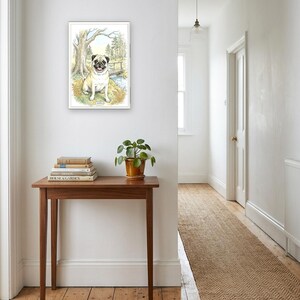 Personalised pet portrait print: Storybook watercolour, A3 in a white frame, bright hallway