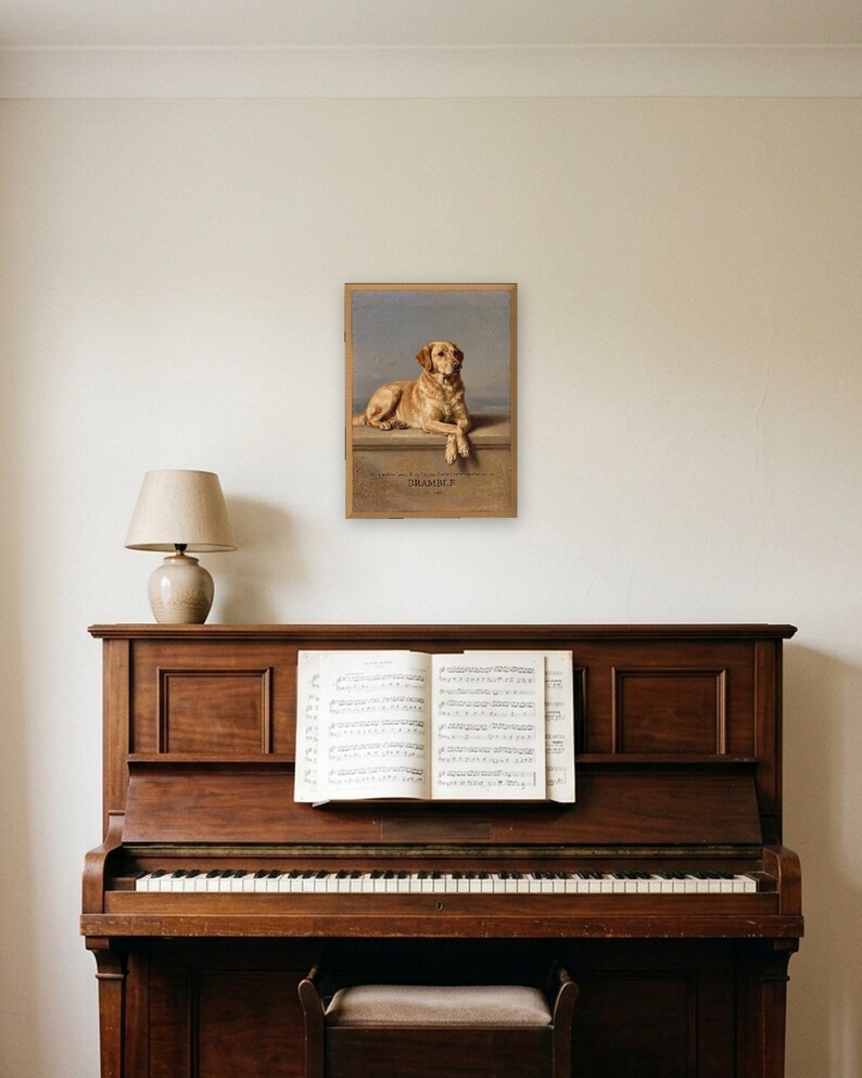 Personalised dog memorial print in the style of Edwin Landseer: a gentle portrait of a dog at rest, with Lord Byron's epitaph, Beauty without Vanity, Strength without Insolence, Courage without Ferocity, and a line for the dog's name and years.