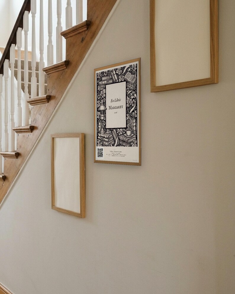 Personalised ex libris bookplate print in engraved ink on cream: a border of stacked books, a reading lamp and a cup of tea, with Ex Libris above and a mum's name and a year set in the centre.