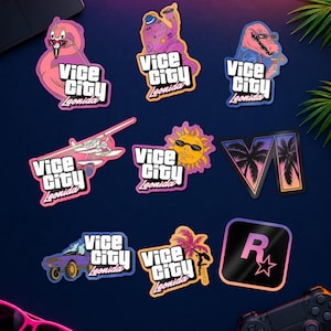 Può includere: Una collezione di nove adesivi con il marchio Vice City Leonida, tra cui un fenicottero, un coccodrillo, un idrovolante, un sole, un'auto, una palma e il logo Rockstar Games, tutti presentati con colori vivaci e testo in grassetto.