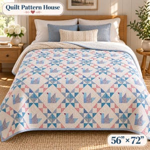 May include: A quilt measuring 56 inches by 72 inches featuring a repeating pattern of blue and pink geometric bird shapes on a white background. The quilt is draped over a bed with white, blue, and cream pillows. The text Quilt Pattern House is visible.
