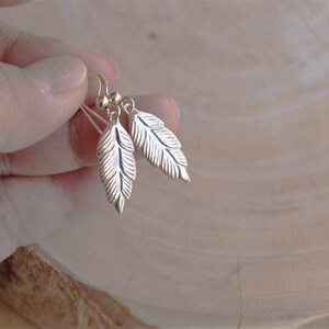 14k Gold Fill Feather Dangle Earrings: Lucky Charm Jewelry