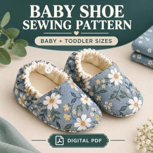 May include: A digital PDF baby shoe sewing pattern featuring baby and toddler sizes. The image displays a pair of blue fabric shoes with a white and yellow daisy floral print, featuring an elasticized opening and a small white button.