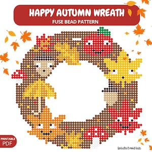 May include: A fuse bead pattern titled HAPPY AUTUMN WREATH FUSE BEAD PATTERN featuring a circular wreath made of brown beads decorated with colorful pixelated autumn leaves, red apples, mushrooms, and acorns with smiling faces.