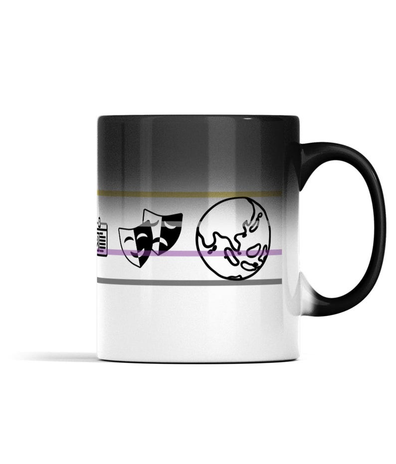 May include: A ceramic mug with a black handle and a gradient finish transitioning from black at the top to white at the bottom. The mug features horizontal stripes in gold, purple, and gray, with black line art icons of theater masks and a globe.