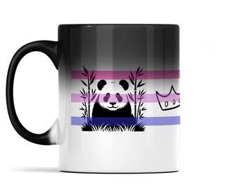 May include: A ceramic mug with a black-to-white gradient finish. The centre features a graphic of a panda sitting among bamboo stalks, flanked by a small crown icon. Three horizontal stripes in pink, light purple, and blue run behind the panda.