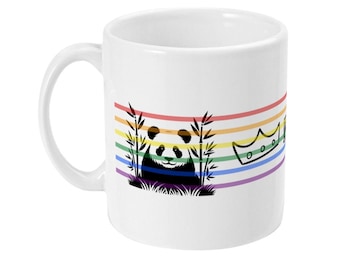 May include: A white ceramic mug featuring a graphic design of a black and white panda sitting among bamboo stalks, accompanied by a crown icon. The design is overlaid with horizontal stripes in red, orange, yellow, green, blue, and purple colors.