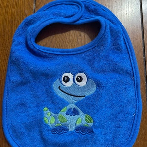 Embroidered Baby Bib - Blue Dinosaur - Royal Blue Bib