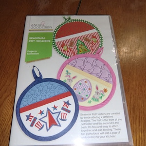 May include: Three round pot holders with embroidered designs. The designs include a Christmas tree, Easter eggs, and a star. The text on the packaging reads "Seasonal Pot Holders Projects Collection".