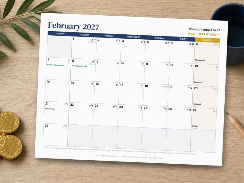 Op de afbeelding: Een wandkalenderpagina voor februari 2027 met een rasterindeling met de dagen van de week in het Engels en Hebreeuws. De koptekst toont February 2027 en Shevat - Adar I 5787. De kalender bevat datums, Hebreeuwse tekst en namen van feestdagen.