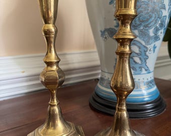 Similar but different Brass Candlestick Duo