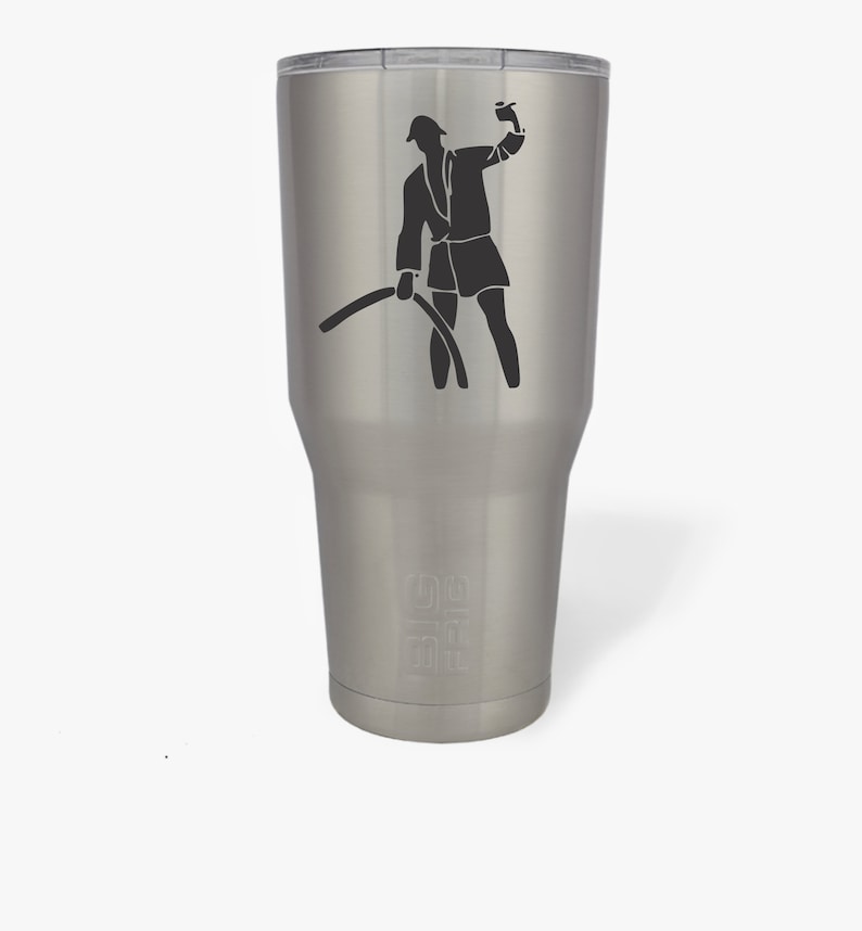 May include: A stainless steel tumbler with a black silhouette of a person in a robe holding a cup and a hose. The tumbler has a black inscription that reads "The 90's"