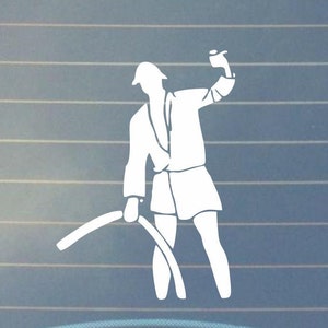 May include: White vinyl decal of a person wearing a robe and holding a hose. The person is facing right and has a raised arm. The decal is on a blue background.