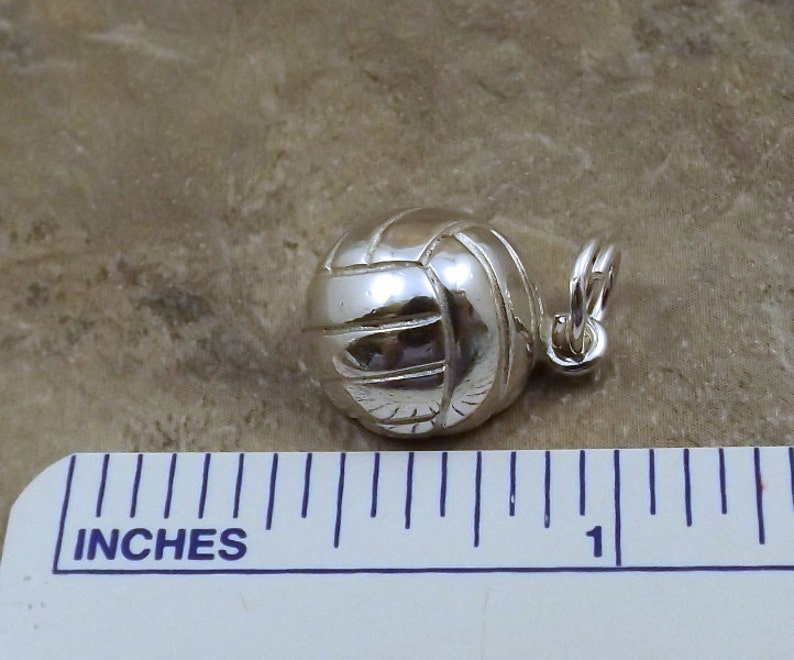 0311 Sterling Silver Volleyball Charm on a Sterling Silver Rolo Bracelet