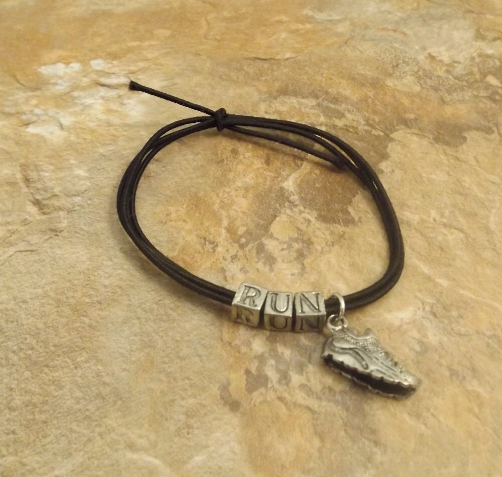 Black Stretch Cord Bracelet with Pewter Letters that say Etsy