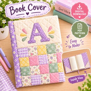 May include: A quilted fabric book cover featuring a patchwork design of floral and gingham squares in shades of purple, yellow, green, and pink. The front panel displays a large purple letter A with decorative stitching and an inside view.