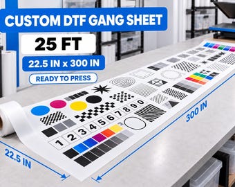 May include: A custom DTF gang sheet measuring 22.5 inches by 300 inches, featuring a variety of black and white geometric patterns, shapes, numbers, and color test swatches printed on a long white roll, labeled as 25 FT and ready to press.