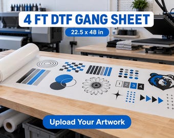 May include: A 22.5 x 48 inch DTF gang sheet roll on a wooden table, featuring various printed graphics including blue and black geometric shapes, a flower, a bear head, and the text 4 FT DTF GANG SHEET and Upload Your Artwork.