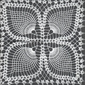May include: White crochet doily with a delicate, intricate design. The doily features a central motif with four radiating points, creating a symmetrical pattern.