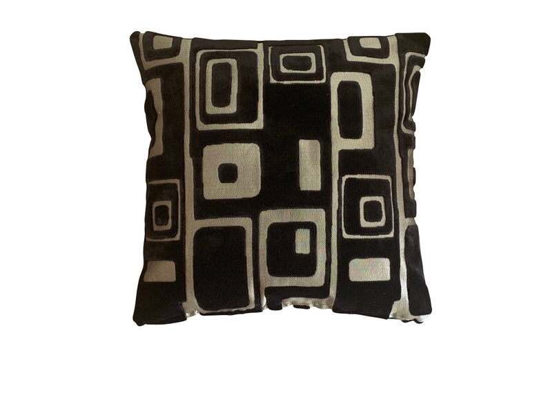 retro style geometric jacquard velvet on a gilded weave Designers Guild