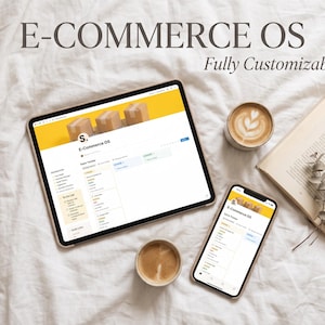 May include: A tablet and a smartphone displaying an E-Commerce OS interface with a yellow header featuring cardboard boxes. The text E-COMMERCE OS Fully Customizable is visible above the devices, alongside two cups of coffee and an open book.