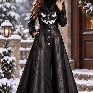 Schwarzer Damen-Ledermantel mit Halloween-Kürbismotiv, Gothic-Chic-Stil, langer, ausgestellter Mantel mit Gürtel, auffällige Winterjacke