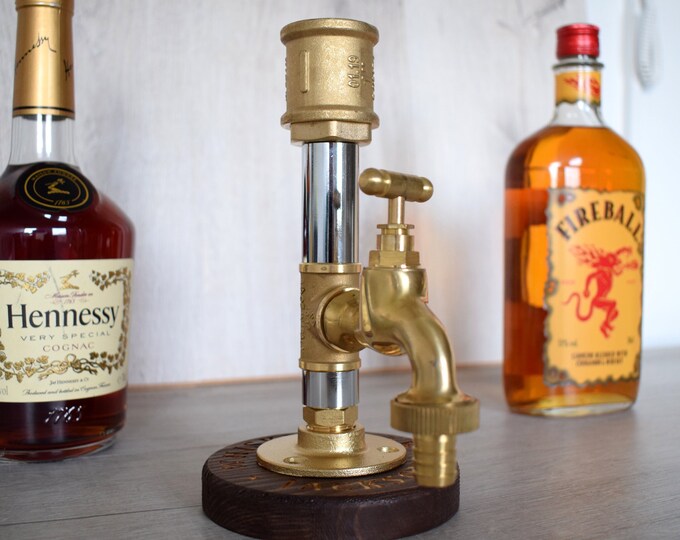Industrial bourbon dispenser, Pipe alcohol dispenser.