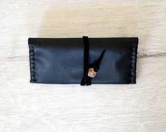 Handmade exclusive leather tobacco pouch available in three colors.
