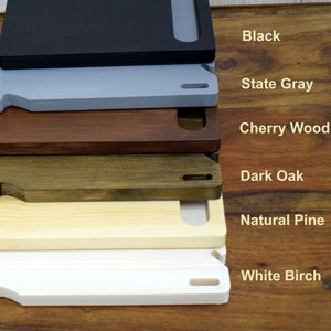 May include: Six wooden shelf boards in different colours: black, state grey, cherry wood, dark oak, natural pine, and white birch.