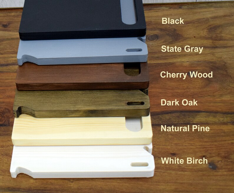 May include: Six wooden shelf boards in different colours: black, state grey, cherry wood, dark oak, natural pine, and white birch.