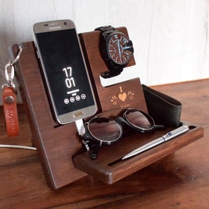 May include: Wooden organiser with slots for a phone, watch, sunglasses, and a pen. The organiser has a personalised inscription that says "I love you" with a heart.