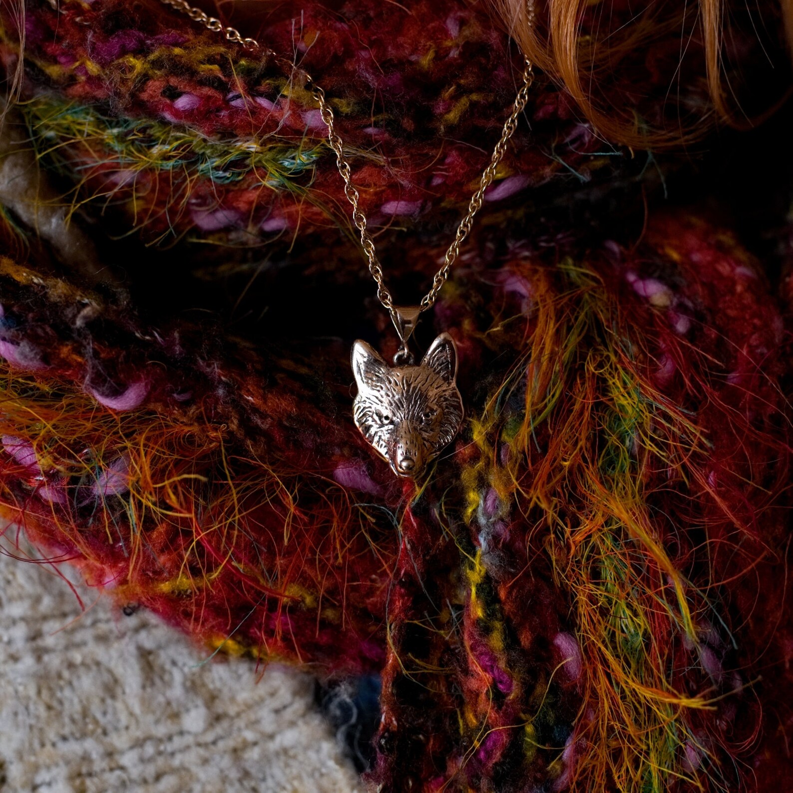 solid gold wolf pendant