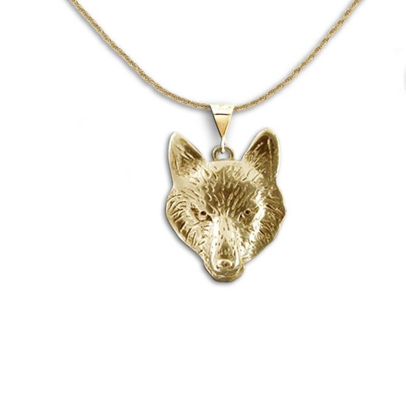 solid gold wolf pendant