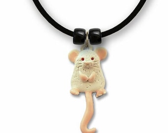 May include: A white mouse charm necklace with a pink tail and red eyes. The necklace is made of black cord with black beads.
