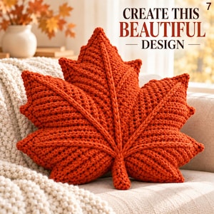 May include: A burnt orange crochet pillow shaped like a maple leaf with raised central veins. The text "CREATE THIS BEAUTIFUL DESIGN" is printed in dark brown letters in the upper right corner, accompanied by the number 7 in the top corner.