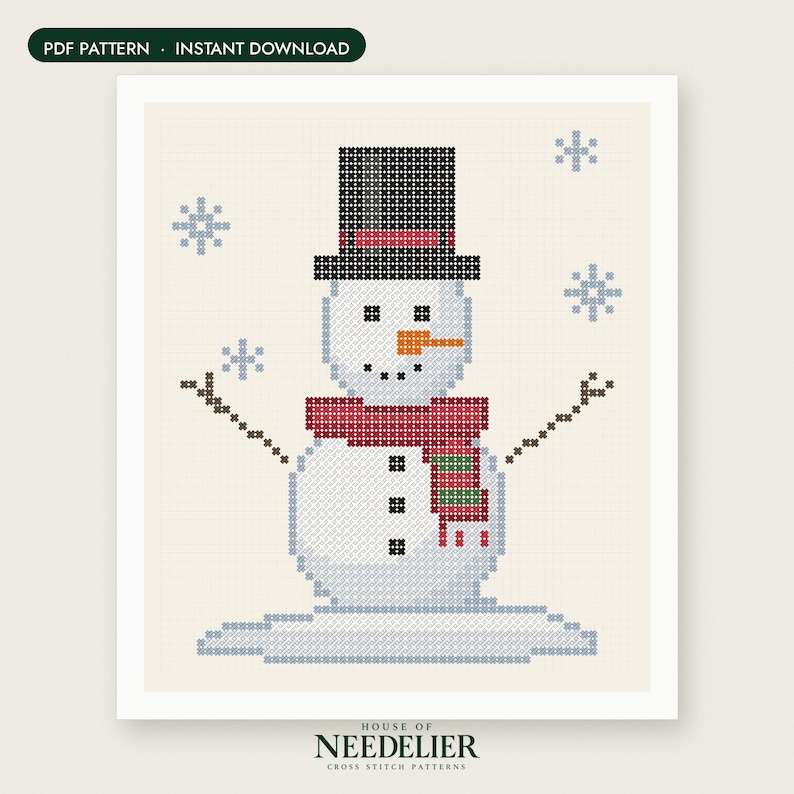 May include: A cross-stitch pattern featuring a snowman wearing a black top hat with a red band and a red and green striped scarf. The snowman has an orange carrot nose, black eyes, and mouth, with brown stick arms and blue snowflakes.