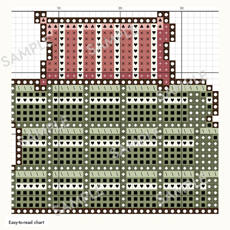 May include: A cross-stitch pattern chart featuring a grid with numbered axes. The top section displays vertical stripes in pink and white with heart and cross symbols. The bottom section shows a green and black grid with heart and diamond icons.