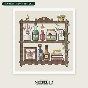 May include: A cross stitch pattern featuring a brown wooden shelf with two tiers. The shelves hold various items including a candle, lavender, glass bottles, a jar with mushrooms, a framed butterfly, books, a key, and a trailing green plant.