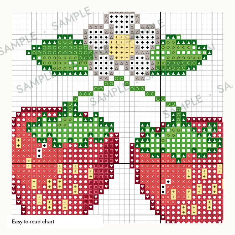 May include: A cross-stitch pattern chart featuring two red strawberries with green leaves and a white flower with a yellow center. The design is presented on a grid with symbols representing colors, and the text "Easy-to-read chart" is at the bottom.