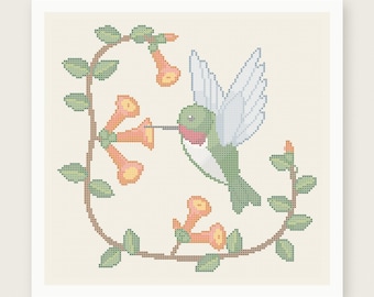 May include: A cross stitch pattern featuring a green and white hummingbird hovering near orange trumpet-shaped flowers on a vine. The design includes the text PDF PATTERN INSTANT DOWNLOAD and HOUSE OF NEEDELIER CROSS STITCH PATTERNS.