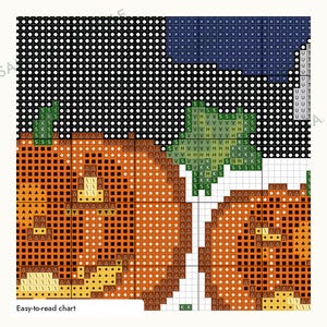 May include: A cross-stitch pattern chart featuring two orange pumpkins with green stems against a black background. The grid displays symbols and letters including S, V, H, K, and U, with the text Easy-to-read chart visible in the bottom corner.